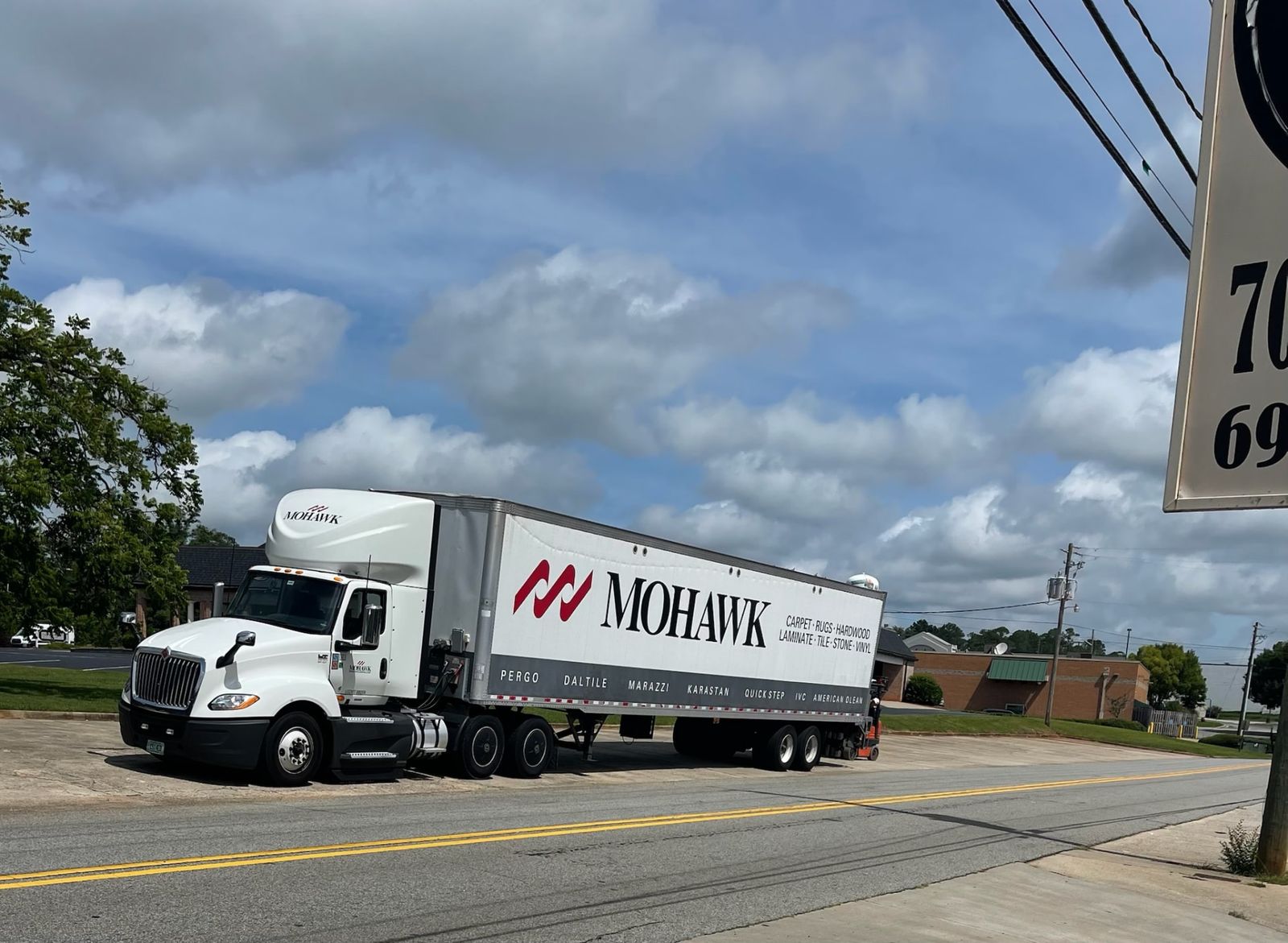 Mohawk delivery truck outside the Middle Georgia Carpets showroom
